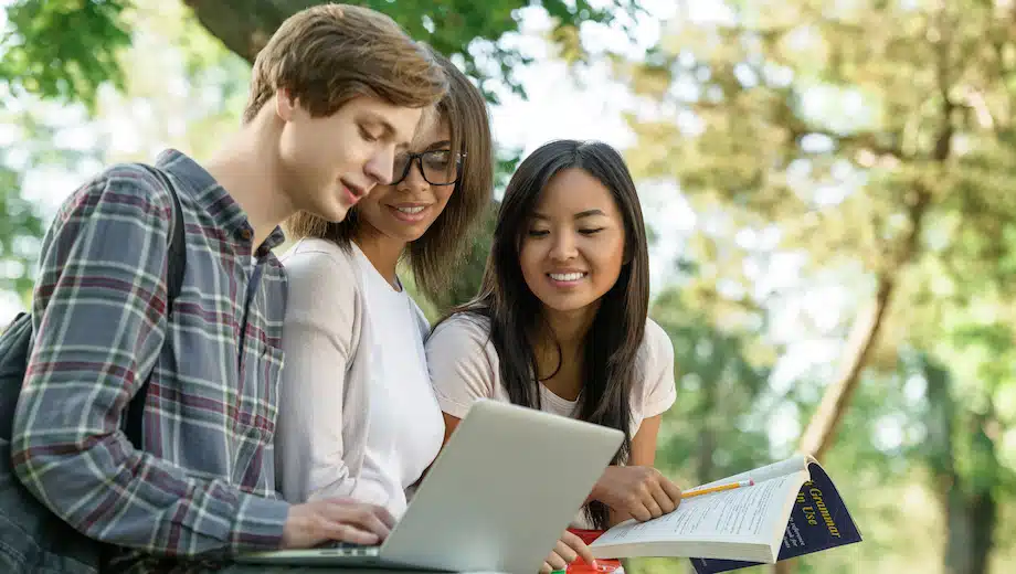 Group of high school students discuss 2021 SAT scores.