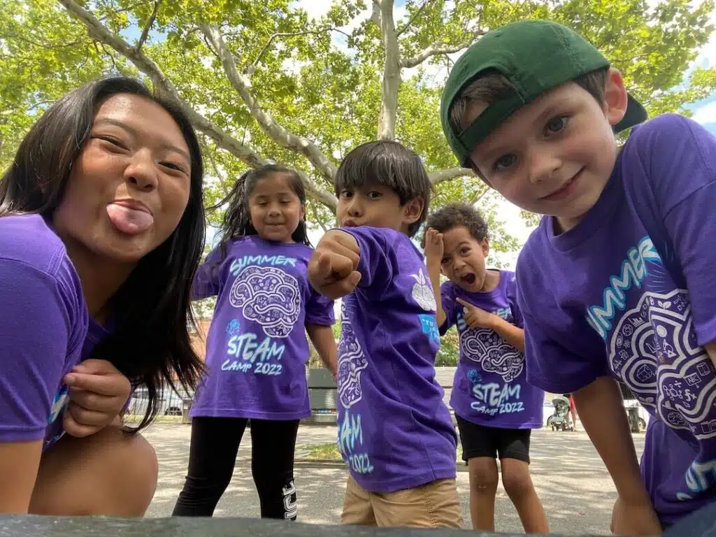 k-2 students having fun at the park summer steam camp
