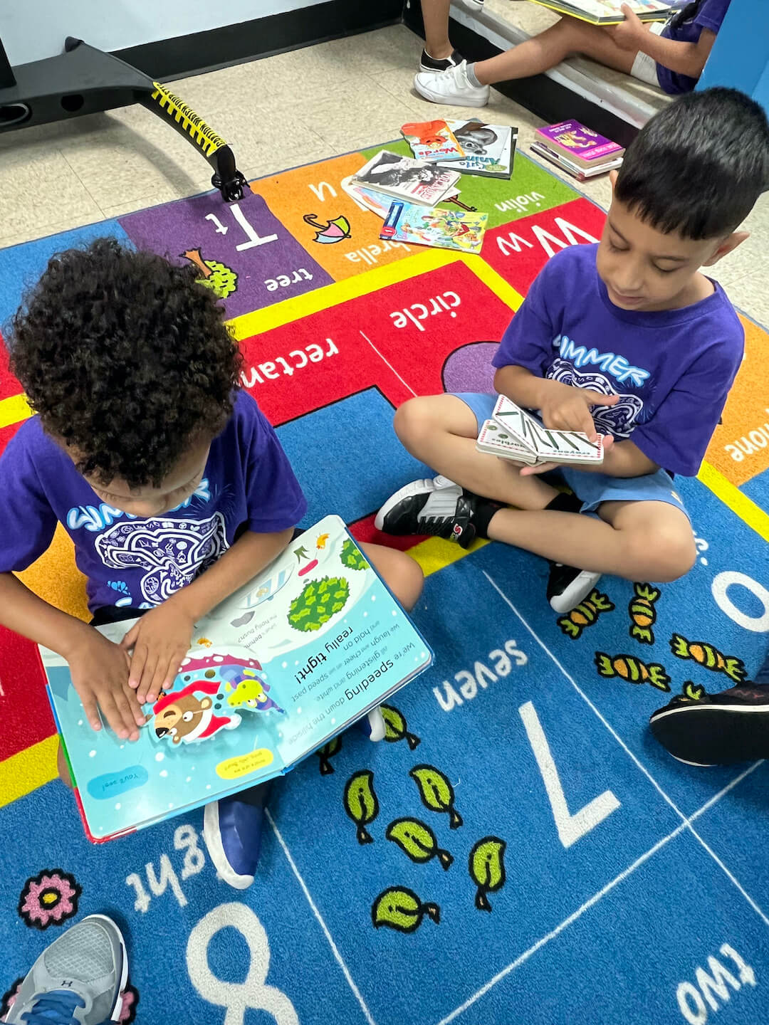 k-2 students reading books summer steam camp