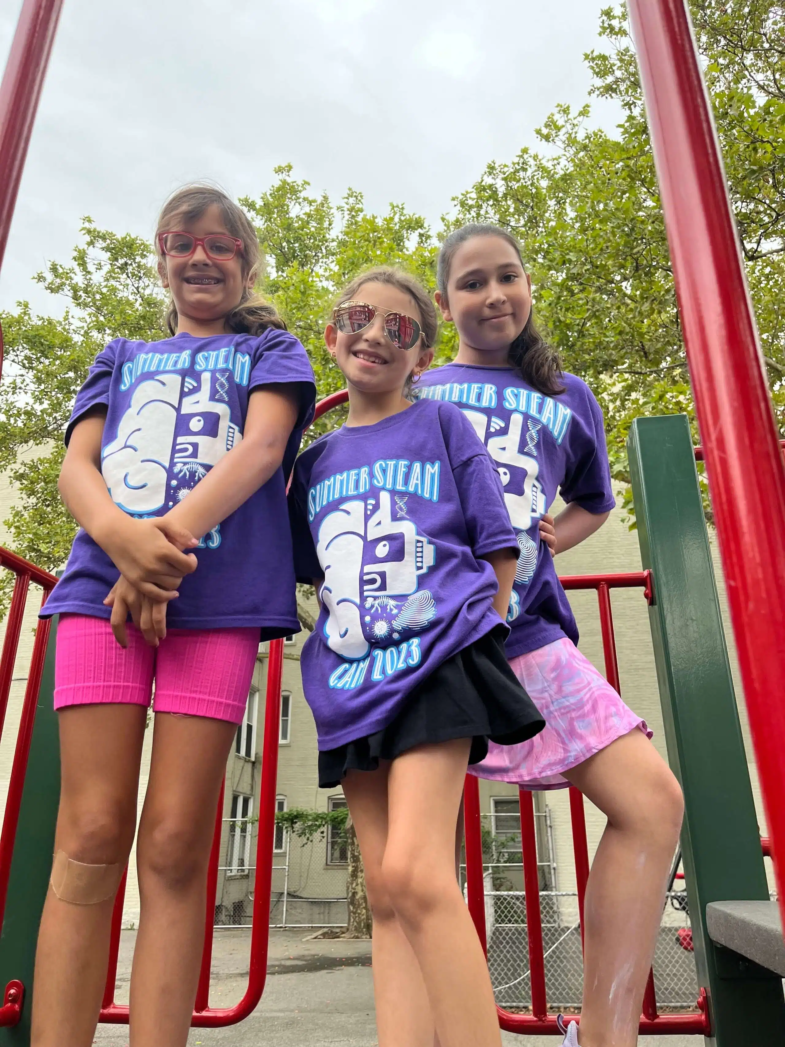 Children enjoying hands-on learning at Tip-Top Brain’s academic summer camp.