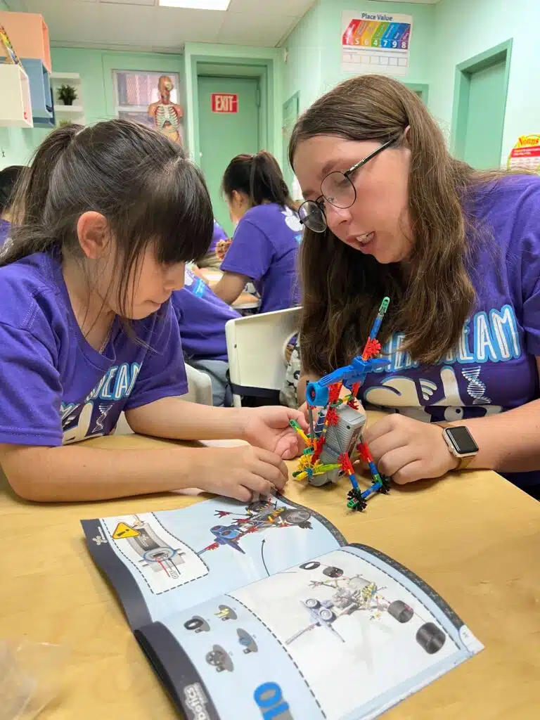 Kids exploring robotics at Tip-Top Brain’s educational STEM summer camp